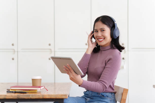 istock Young student studying in classroom at college. Student working at background. education, back to school concept 1499233429