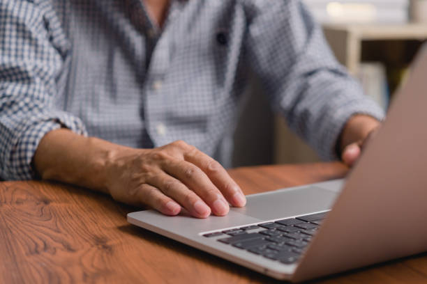 istock Businessperson using keyboard laptop computer job search, communication social networking, internet online Information, working data marketing concept. 1499235038