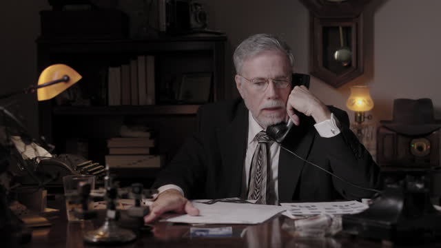 film noir detective making a phone call