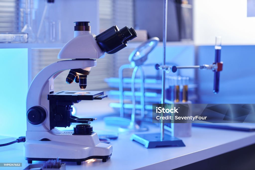 Computer Laboratory Side View Side View Electronic Microscope On Laboratory Workstation In Neon Light ...