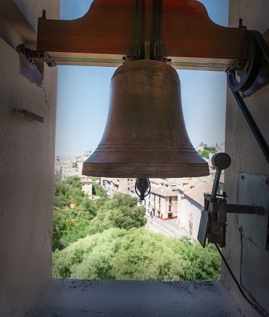 Granada, Spain - Jun 6,  2019: Bell at Church of St. Peter and St. Paul  (Iglesia de San Pedro y San Pablo) - Granada, Andalusia, Spain