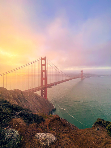 A shot from the Marin Headlands overlooking the Golden Gate Bridge and San Francisco. It was a foggy morning, but the sun broke through just enough during a beautiful and serene sunrise.