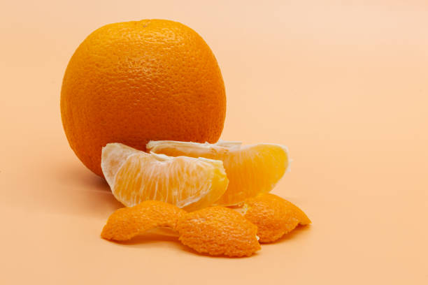 istock Round orange orange and orange slices on orange background 1499263564