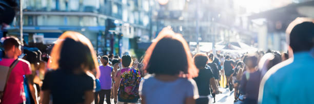 istock unrecognizable motion blurred people walking in the city 1499264787
