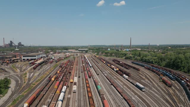 Freight yard with multiple trains and wagons
