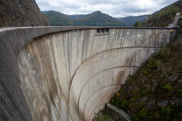 Photo of Hydropower construction, waterworks Dam Vidrau on Transfagarash highway in Romania. Dam and reservoir on Lake Vidraru.