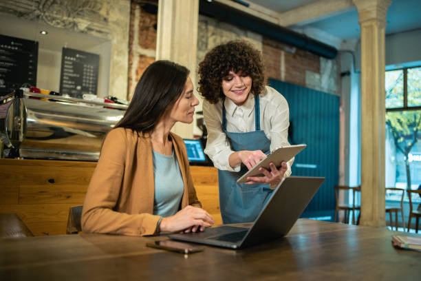 istock Businesswoman making an order at the restaurant 1499309488