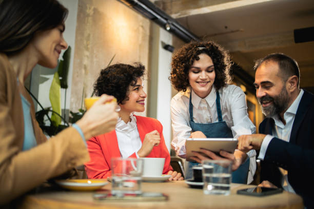 istock Group of business people ordering coffee 1499310150
