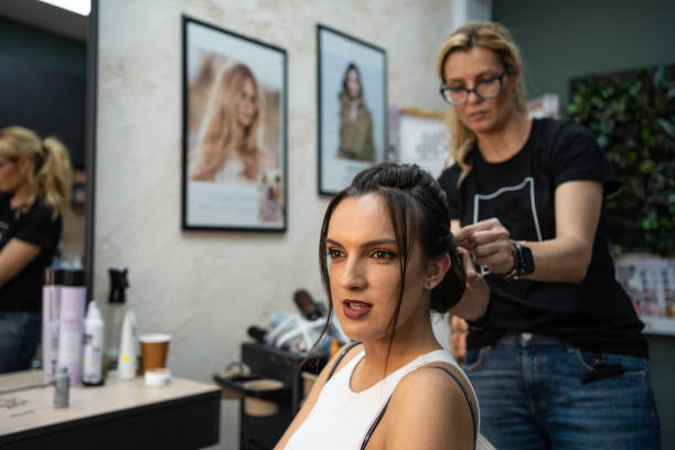 istock Prom Hairstyle Prep. Celebrating High School Graduation. 1499310339