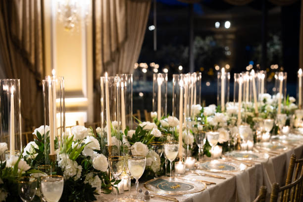 Flowers Ceremony Design Arrangements Roses Candles Light Cake Beautiful Events Event Reception Flower Floral Bride Silverware Plates Table Wedding Marriage Couple Engagement Sunflower Centerpiece Arch Bokeh Chairs Plants Garden Nature Lights Bouquet Immerse yourself in the beauty of meticulously designed flower ceremony arrangements featuring enchanting roses, delicate candles, and captivating lighting. Enhance your event reception with stunning floral centerpieces, accompanied by elegant silverware and plates.
Experience the romance of a garden-inspired wedding under a picturesque arch adorned with vibrant flowers. Indulge in the sweetness of a beautifully crafted cake adorned with intricate sugar flowers that perfectly complements the event's floral theme. Capture the essence of love and joy through radiant images of a bride holding a breathtaking bouquet of roses and sunflowers. Set a magical atmosphere with bokeh lights casting a romantic glow, while chairs adorned with elegant floral arrangements add charm and sophistication.
Bring the beauty of nature indoors with potted plants and lush greenery, transforming your event space into a serene garden oasis. Illuminate your celebration with the warm ambiance of candles, creating an intimate and inviting atmosphere. Celebrate the beauty of sunflowers in a stunning centerpiece that captivates with its vibrant colors and natural charm. Discover the artistry and elegance of floral design, adding a touch of enchantment to weddings, marriages, and engagement events. garden lights candle stock pictures, royalty-free photos & images