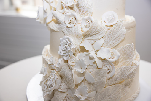 elegant wedding cake with vintage bride and groom figurine