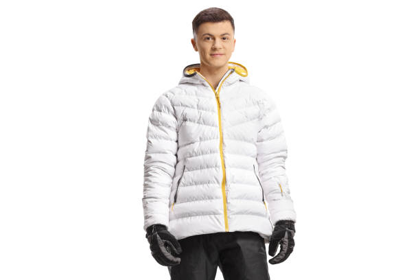 istock Guy in a white winter jacket and skiing pants 1499318186