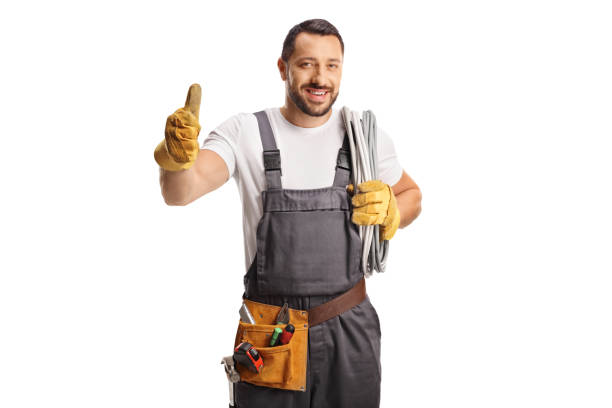 istock Electrician holding cable on his shoulder and gesturing thumbs up 1499318200