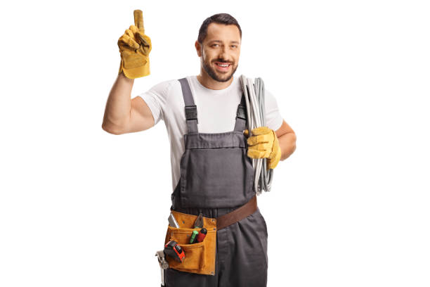 istock Electrician holding cable on his shoulder and pointing up 1499318745