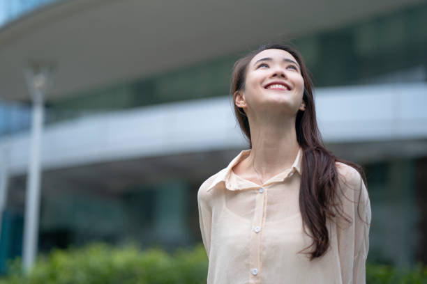 istock Young asian woman outside her office 1499320438