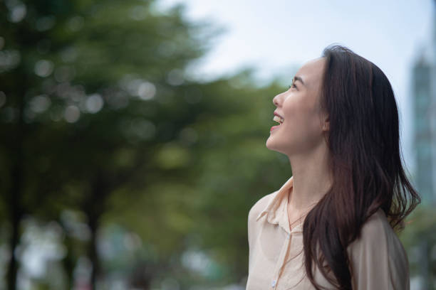 istock Close up side profile of young asian office worker 1499321112