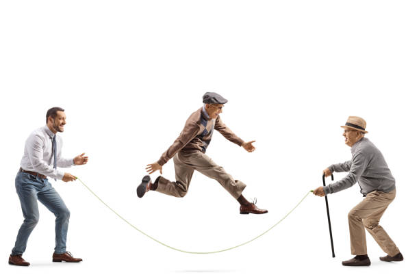 istock Young and older men playing skipping rope 1499321725