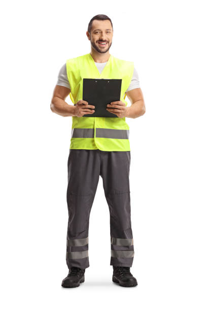 istock Worker in a fluorescent vest holding a clipboard 1499321747