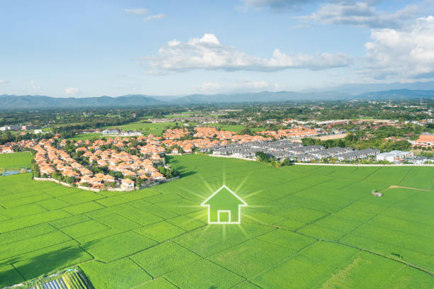 istock Green fields and dream house in aerial view. 1499339080