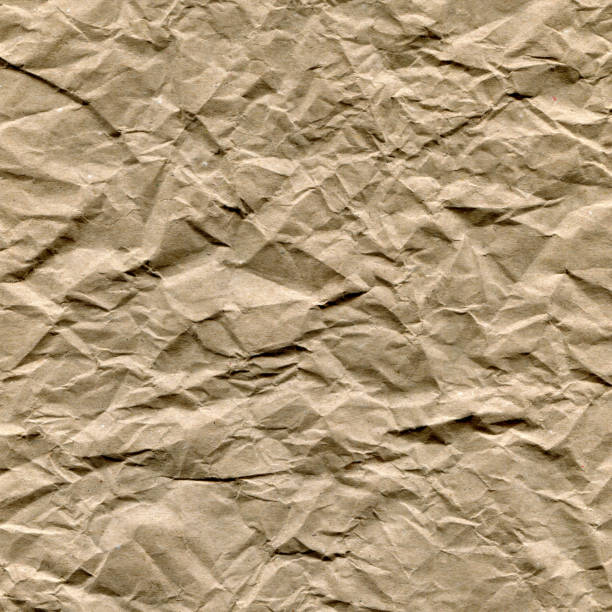 fondo texturizado de papel marrón arrugado - paper craft brown wrinkled fotografías e imágenes de stock