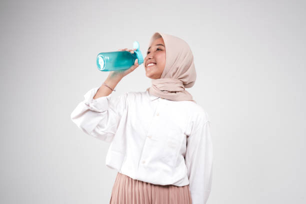 istock Happy muslimah isolated whita background 1499344904