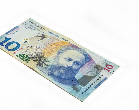Ten Lari banknote of the National Bank of Georgia on a white background
