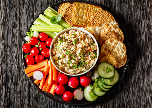 istock salmon salad with fresh veggies and crackers 1499366077