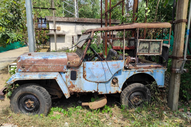 istock A rustic vintage abandoned car is left in a neglected condition in the garden 1499367487