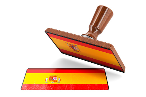 Wooden stamper, seal with Spanish flag, 3D rendering isolated on white background