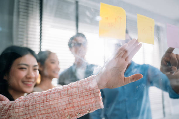 istock Group of business people working together at modern office 1499369808