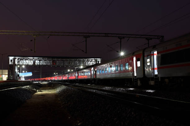 istock Express train at night on railroad track 1499373020