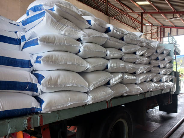 Chemical fertilizer. Chemical fertilizer The product stock is packed in sacks, stacked in the warehouse, waiting for delivery. plant fertilizer stock pictures, royalty-free photos & images