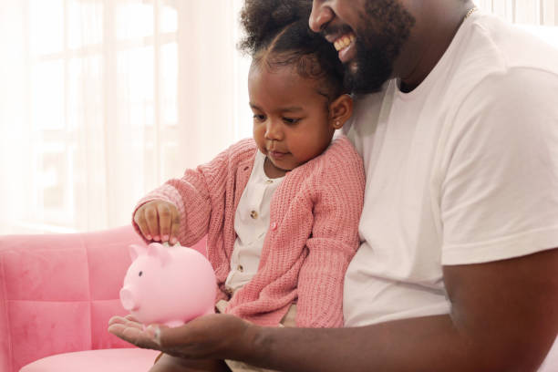 istock Happy daughter playing together with father at home 1499382747