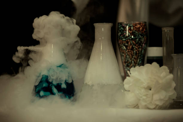 istock In a chemical laboratory, flasks filled with solutions in smoke. 1499382940