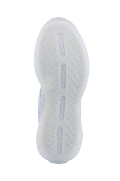 istock White rubber shoe sole isolated on white background. 1499383047