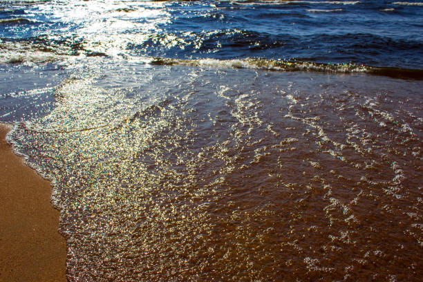 Lake Baikal shore with fresh water waves