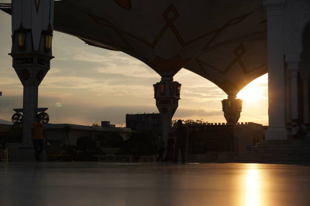 Ramadan, Eid ai-fitr,New year Muharram islamic religion Symbols with silhouette mosque dome and crescent moon on  twilight sky in night sunset. arabic,Eid al-adha,mubarak  Muslim concept.