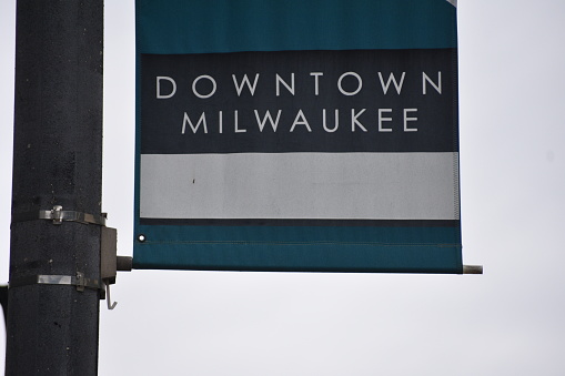 Downtown Milwaukee banner text sign on street