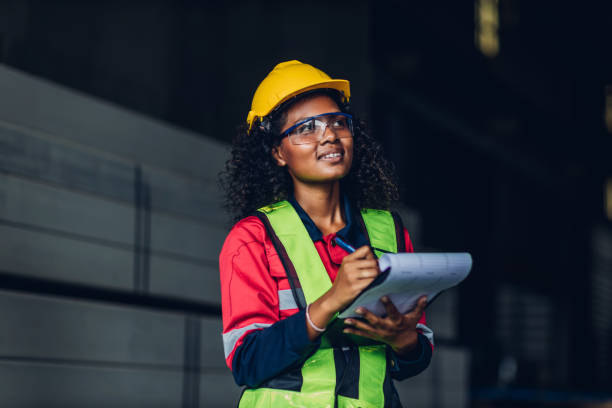 istock Workers Factory or Engineering work at factory site check up machine or products in site. Foreman or Technician checking Material or Machine on Plant. Heavy industry factory concept. 1499390194