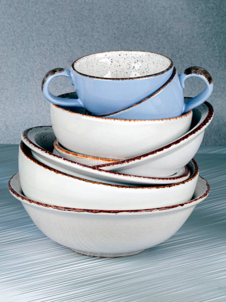istock Ceramic bowls and cups are stacked on top of each other. 1499390403