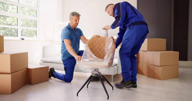 Furniture Movers Packing And Wrapping stock photo