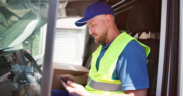 istock Portrait Of Confident Delivery Man Smiling 1499392835