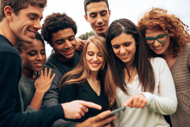istock group of student at the park 1499394308