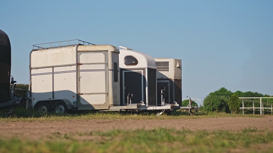 Horse Trailers Parked on Open Field Hippdrome during Tournament Season