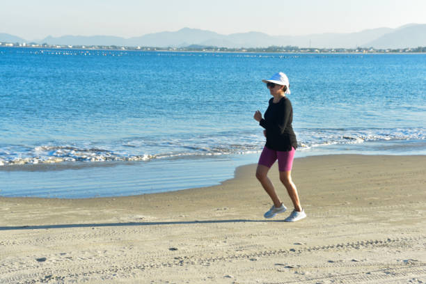 woman running on the beach