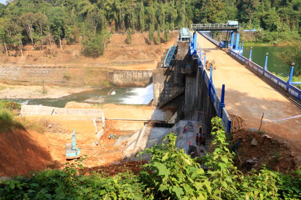 istock construction workers do maintenance at peruvannamuzhi (peruvannamoozhi) dam, Kerala, India, Kuttyady (Kuttiady, Kuttyadi) 1499407756
