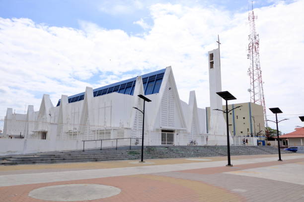 March 12 2023 - Liberia, Guanacaste in Costa Rica: Outdoor view of beautiful white church in gorgeous blue sky on summer day