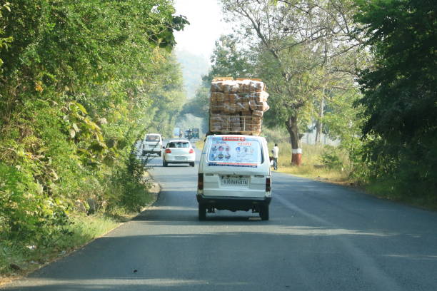 December 23 2022 - Vadodara (Baroda) district, Gujarat in India: Indian Traffic on dusty streets