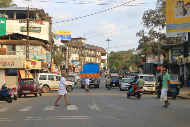 December 29 2022 - Kannur district, Kerala in India: Indian Traffic on dusty streets
