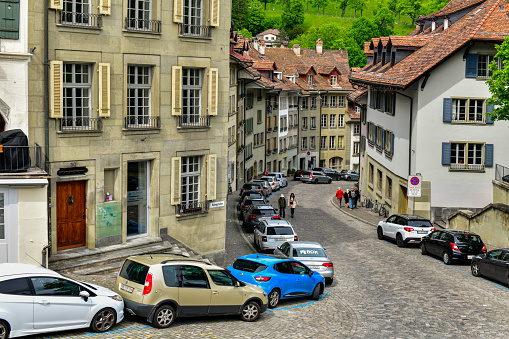 Bern-May 20 ,2023 :Old town view with tourists in Kramgasse street in Bern Switzerland